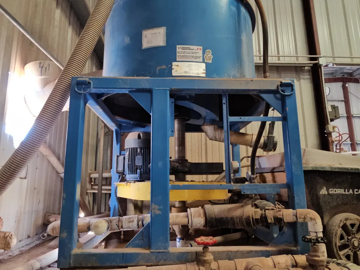Hy-G P21 concentrator on its frame with motor, outdoors under a shed.